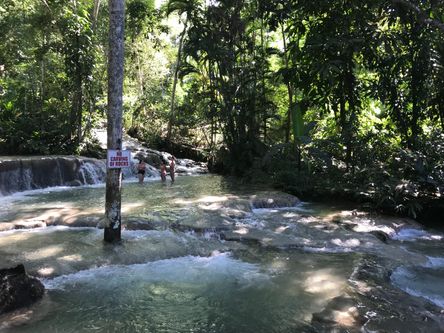 People standing in body of water